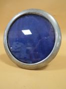 A CONTINENTAL .800 SILVER MOUNTED ROUND PICTURE FRAME