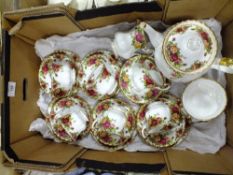 A ROYAL ALBERT OLD COUNTRY ROSES TEAPOT TOGETHER WITH SIX TRIOS