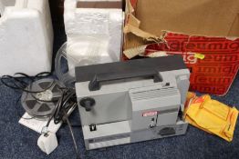 A BOXED EUMIG PROJECTOR'