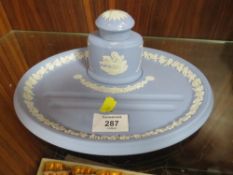 A WEDGWOOD JASPERWARE INKWELL ON PEN TRAY