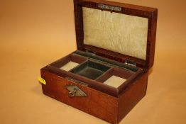 AN ANTIQUE LEATHER JEWELLERY BOX WITH KEY