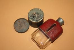 A TIN OF EARLY AIR RIFLE PELLETS TOGETHER A SMALL LEATHER COATED HIP FLASK