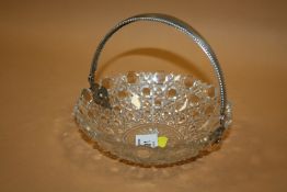 AN ANTIQUE CUT GLASS BOWL WITH DUTCH SILVER MOUNTS