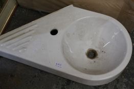 A CORNER WASH BASIN