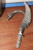 A BRASS TAP IN THE FORM OF A SWAN