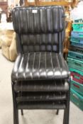 A SET OF FOUR MODERN UPHOLSTERED BLACK DINING CHAIRS