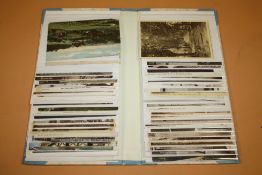 AN ALBUM OF VINTAGE AND ANTIQUE POSTCARDS