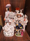 FIVE ASSORTED ANTIQUE STAFFORDSHIRE STYLE FLATBACK FIGURES