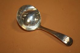 A GEORGIAN HALLMARKED SILVER CADDY SPOON
