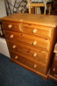 A MODERN PINE FIVE DRAWER CHEST H- 102 W- 91 CM