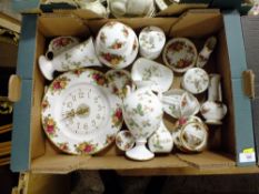 A BOX OF ROYAL ALBERT OLD COUNTRY ROSES AND WEDGWOOD WILD STRAWBERRY
