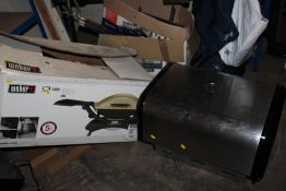 A BOXED BBQ TOGETHER WITH ANOTHER EXAMPLE ( CONTENTS NOT CHECKED )