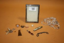 A SMALL BOX OF COLLECTABLES TO INCLUDE A HALLMARKED SILVER PICTURE FRAME' SILVER BLADED FRUIT KNIFE'