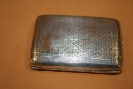 A HALLMARKED SILVER CIGARETTE CASE