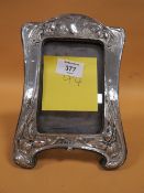 AN ANTIQUE HALLMARKED SILVER ART NOUVEAU PICTURE FRAME