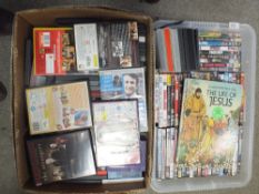 TWO BOXES OF DVDS