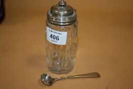 AN ANTIQUE HALLMARKED SILVER TOPPED CONDIMENT JAR AND CONDIMENT SPOON