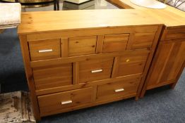 A MODERN PINE 9 DRAWER CHEST H-80 CM W-100 CM A/F