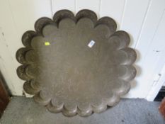 A LARGE EASTERN STYLE BRASS CHARGER WITH FIGURATIVE DETAIL W - 71CM