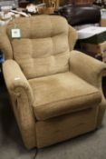 A MODERN UPHOLSTERED ELECTRIC RISE/RECLINE ARMCHAIR