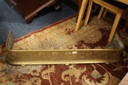 AN ANTIQUE BRASS CURVED FIRE FENDER W-110 CM