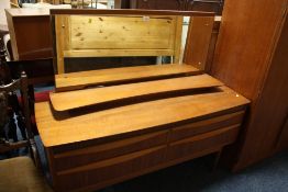 A RETRO MID CENTURY TEAK DRESSING TABLE W-128 CM AND A BEDSIDE CHEST (2)