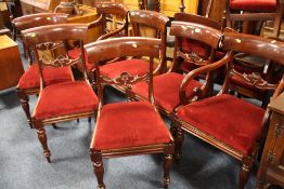 A SET OF SEVEN ANTIQUE MAHOGANY DINING CHAIRS RAISED ON FLUTED SUPPORTS (5+2)