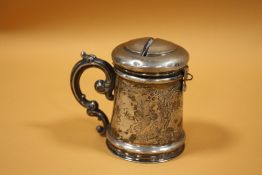 AN UNUSUAL ANTIQUE CONTINENTAL WHITE METAL MONEY BOX TANKARD DATED 1852