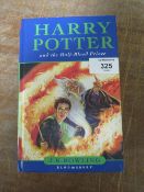 A FIRST EDITION HARDBACK COPY OF HARRY POTTER & THE HALF BLOOD PRINCE WITH ERROR ON PAGE 99