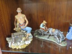 A CAPODIMONTE FIGURE OF A PIRATE SIGNED VOLTA TO BASE' TOGETHER WITH A BOY ON A HORSE AND CART