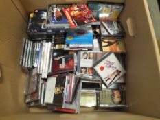 A LARGE BOX OF CDS AND DVDS ETC.