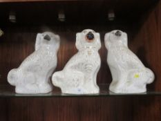 THREE LARGE STAFFORDSHIRE STYLE FIRESIDE SPANIELS