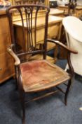 AN EDWARDIAN MAHOGANY ARMCHAIR