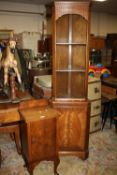 A WALNUT POT CUPBOARD AND A CORNER CABINET (2)