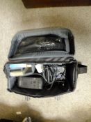 A SAMSUNG CAMCORDER IN CARRY BAG
