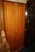A MODERN HONEY PINE DOUBLE WARDROBE H-177CM W-81 CM