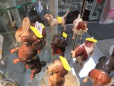 A COLLECTION OF BESWICK DOG FIGURES' POOLE RABBIT FIGURE ETC (12)