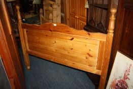 A MODERN HONEY PINE DOUBLE HEADBOARD