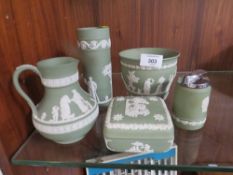 FIVE PIECES OF GREEN WEDGWOOD JASPERWARE TO INCLUDE A TABLE LIGHTER (5)