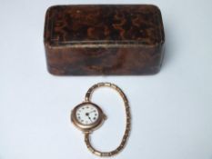 A LADIES VINTAGE 9CT GOLD ROLEX WRISTWATCH