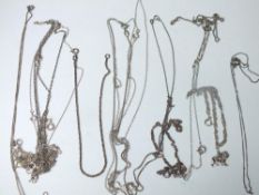 SELECTION OF 12 SILVER CHAINS TOGETHER WITH SIX SILVER BRACELETS