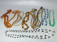 SEVEN VINTAGE CRYSTAL NECKLACES