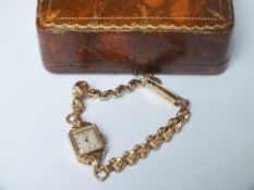 A 9CT GOLD TUDOR ROLEX LADIES WRISTWATCH