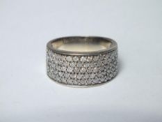 A HALLMARKED 9CT WHITE GOLD & DIAMOND SET RING