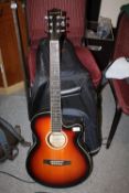 A SUMO ELECTRO ACOUSTIC GUITAR WITH STAGG CARRY CASE