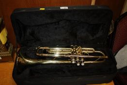 A CASED ELKHART TRUMPET (NO MOUTHPIECE)