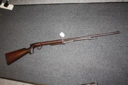 A BSA LINCOLN JEFFRIES .177 AIR RIFLE CIRCA 1907, having underlever cocking and tap loader, makers