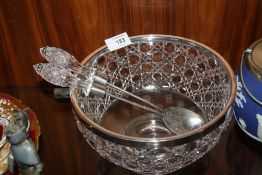 A CUT GLASS SALAD BOWL WITH A WHITE METAL RIM TOGETHER WITH HALLMARKED SILVER CUT GLASS HANDLED