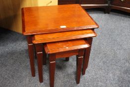 A STAG MINSTREL NEST OF TABLES