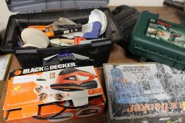 A TOOLBOX AND CONTENTS, TOGETHER WITH A BLACK AND DECKER JIGSAW, CASED BOSCH DRILL AND OTHER BLACK